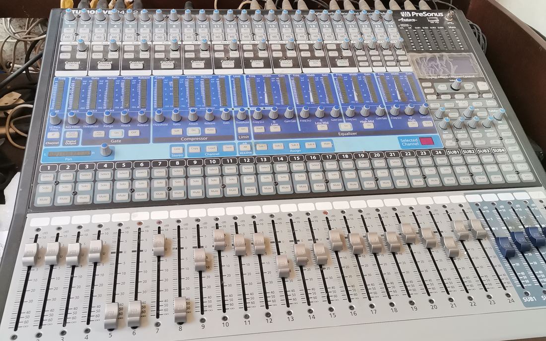 Megiddo engineer at the mixing console during a live event